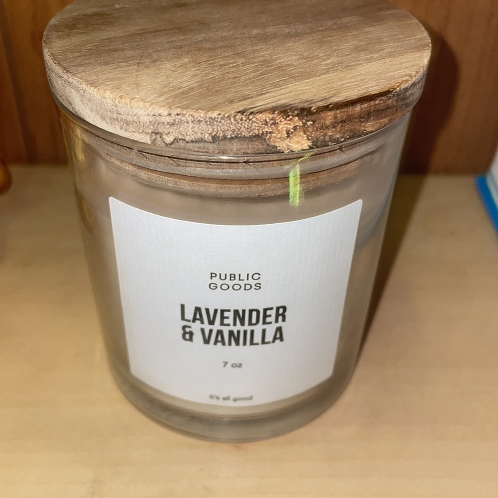 White wick candle, the scent is lavender and vanilla